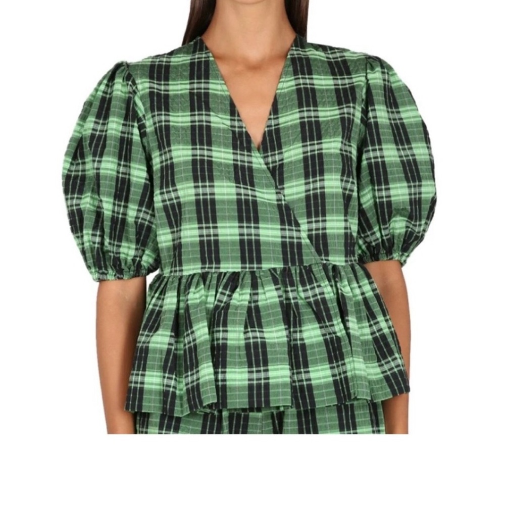 Ganni peplum top. New without tag. Size 38 US size 6 .